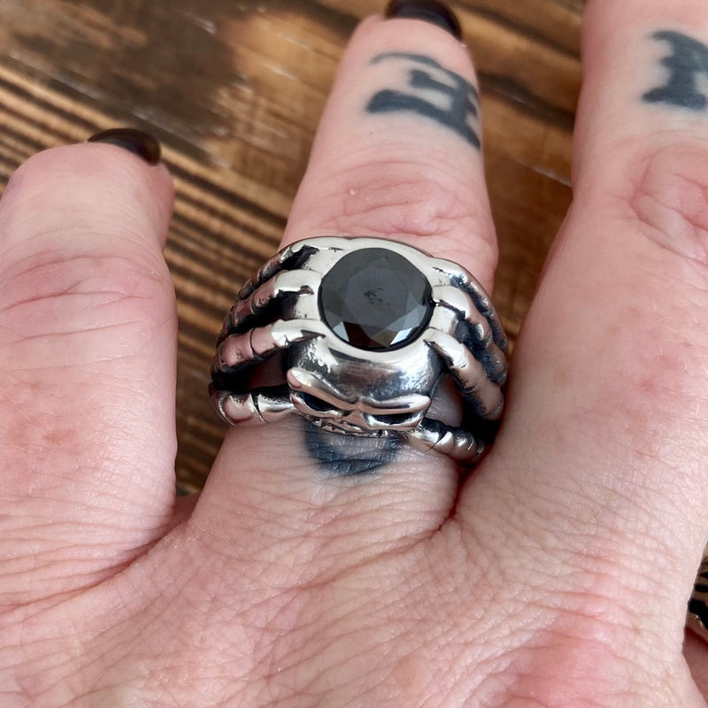Sanity Jewelry Skull Ring "Black Stone" - Skeleton Hands W/Blackstone- Sizes 8-16 - R212